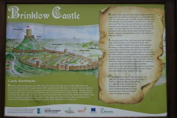 Brinklow Castle information board.